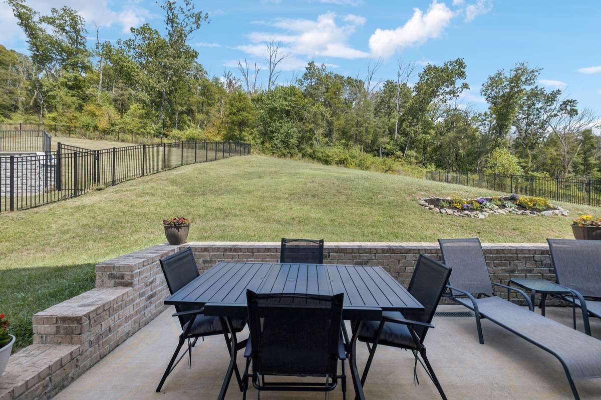 CURRENT PATIO AND BACKYARD LAYOUT (See last photo for a conceptual AI design of how the backyard could be landscaped)