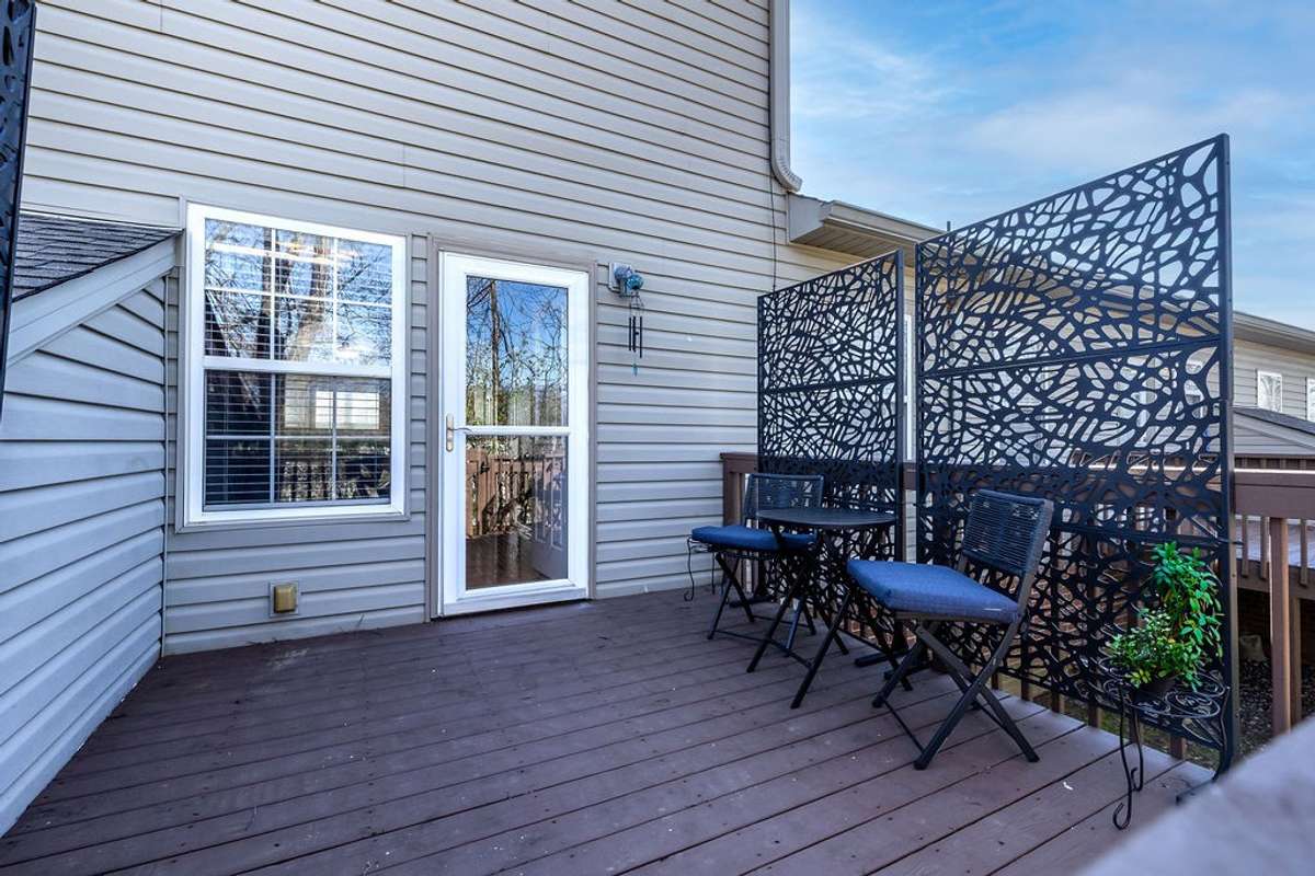 A good sized raised back deck for morning coffee or relaxing after a long day at work. Deck has recently been refinished. Trees fill in for summer providing privacy.