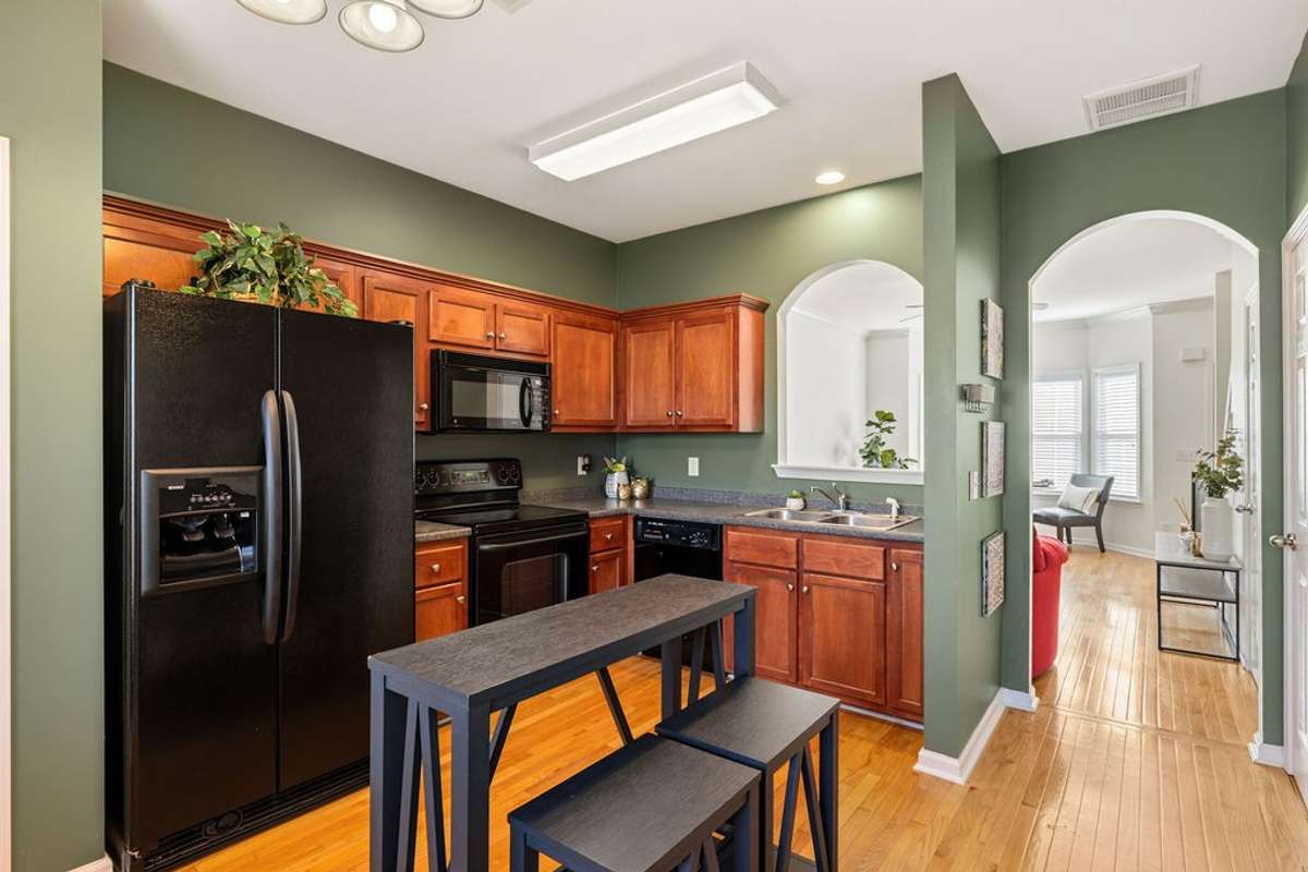 Refrigerator to remain with the home.