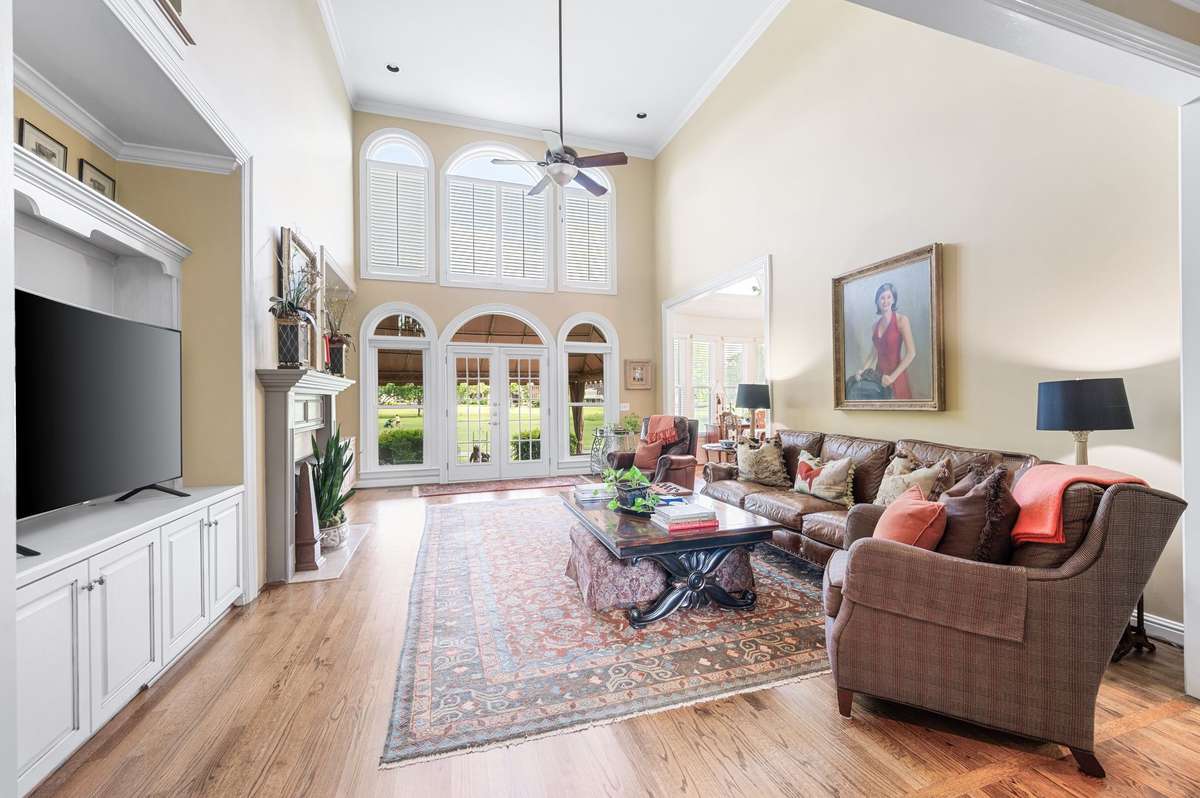 Windows open floorpan , plantation shutters, fireplace custom built-ins.