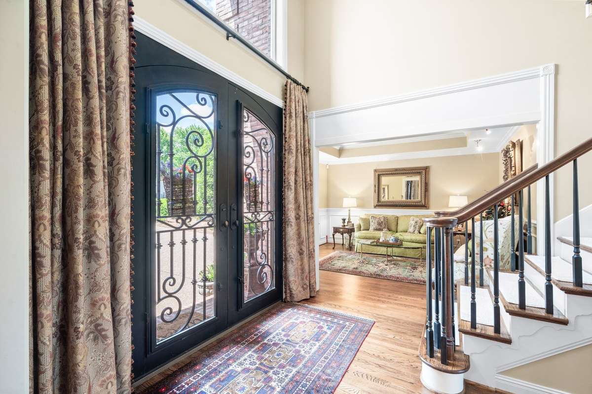 Wrought Iron & Glass entry doors.