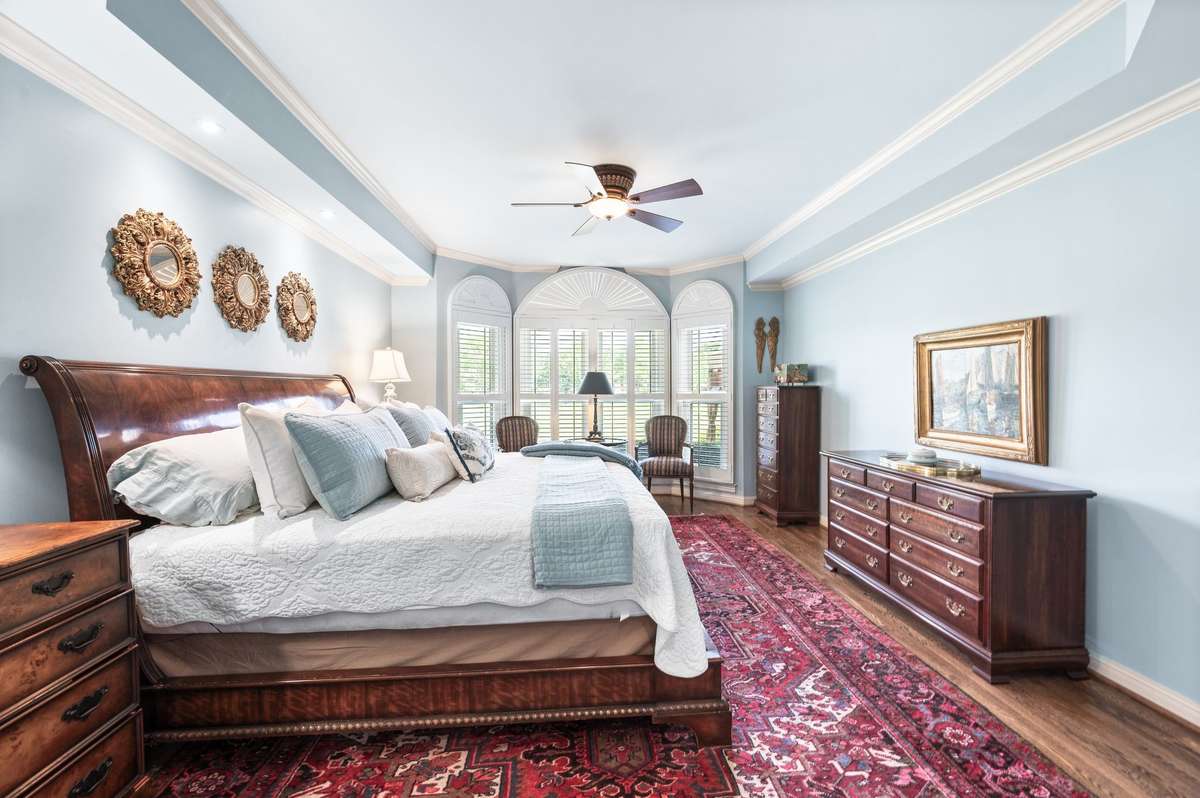 Plantation shutters , hardwood flooring,  fresh new paint. new ceiling fans.