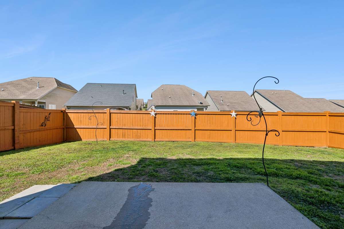 The backyard has a privacy fence for your enjoyment or use it to keep the kids or dog inside without worry.