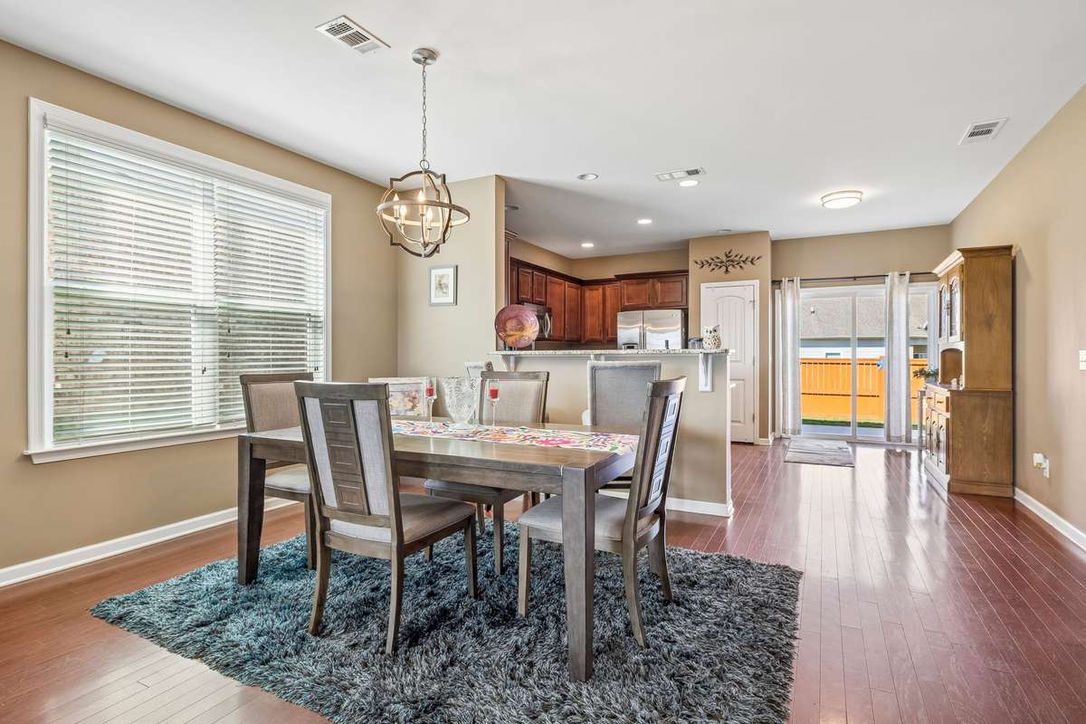 The flow from the living room to dining and to the kitchen is smooth!