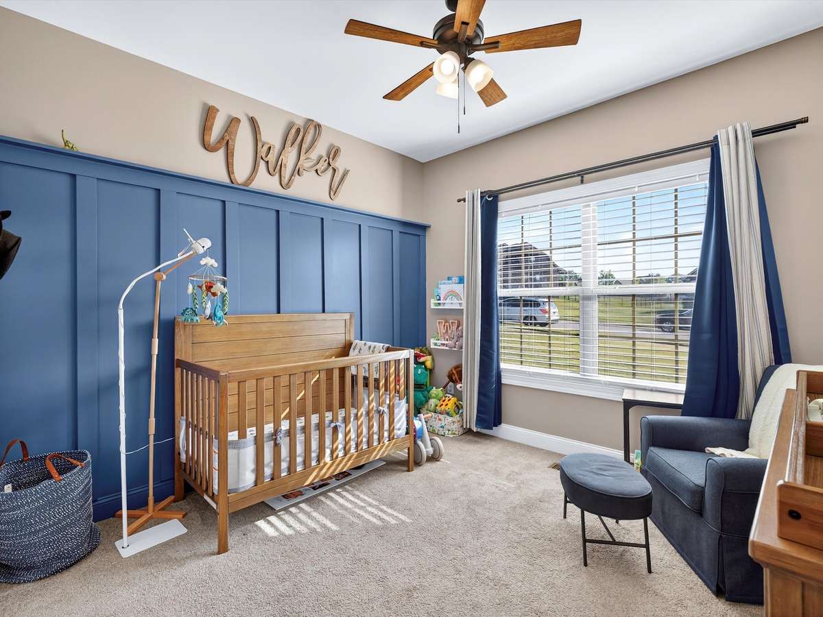 2nd bedroom on main level overlooking the front yard.