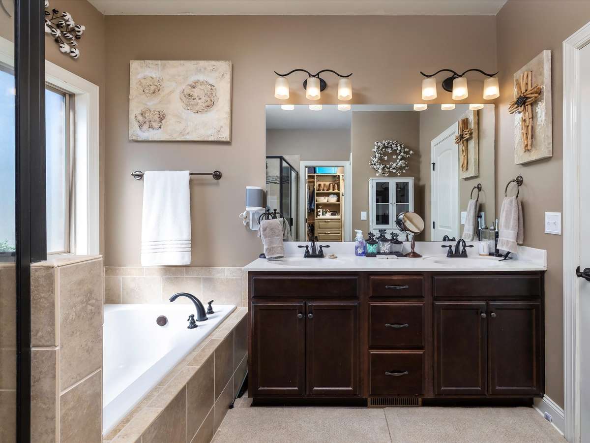 Lots of cabinet storage at these double sinks