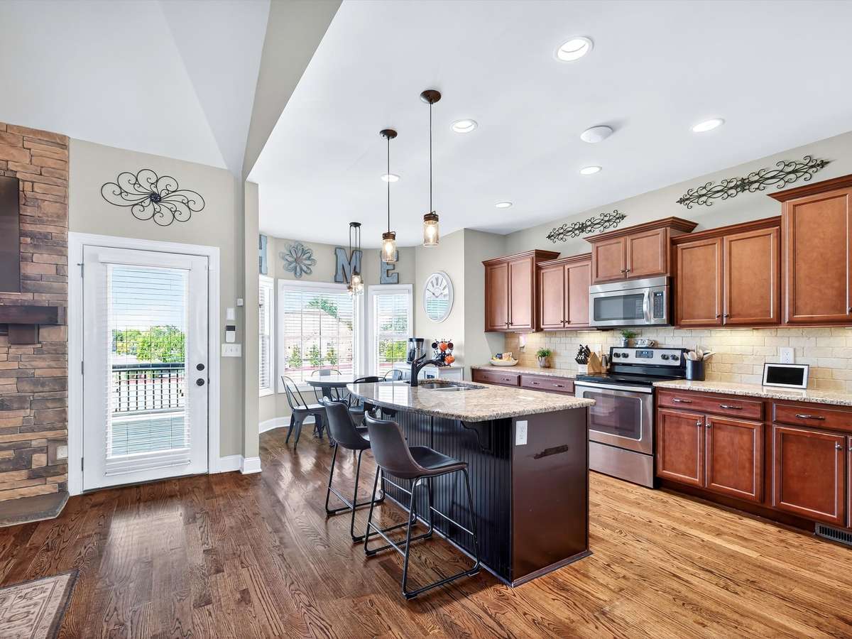 Natural sun adorns the kitchen providing perfect lighting throughout the day.