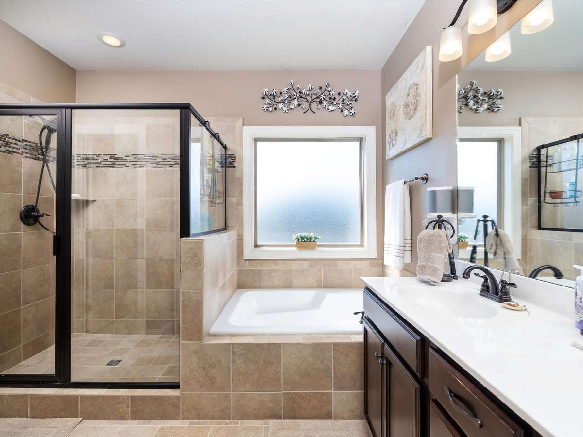 Master bath attach to master bedroom, with double sinks and seperate shower and soaking tub