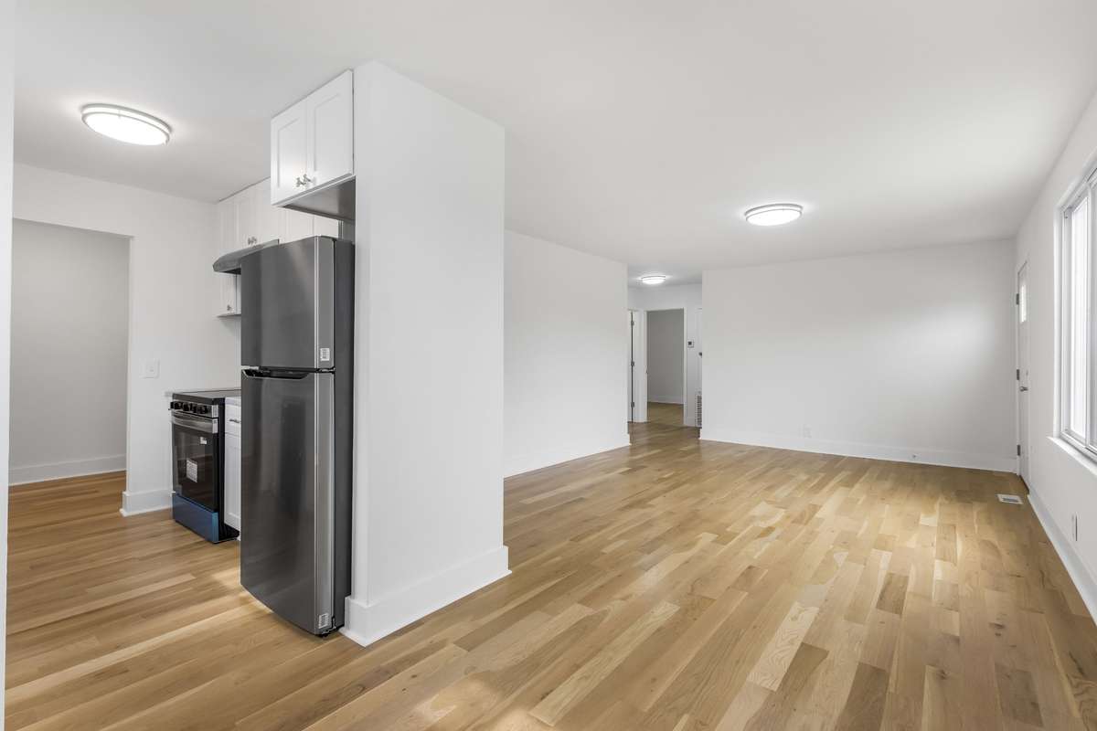 A flexible space just off the kitchen that could serve as a dining area or office nook.