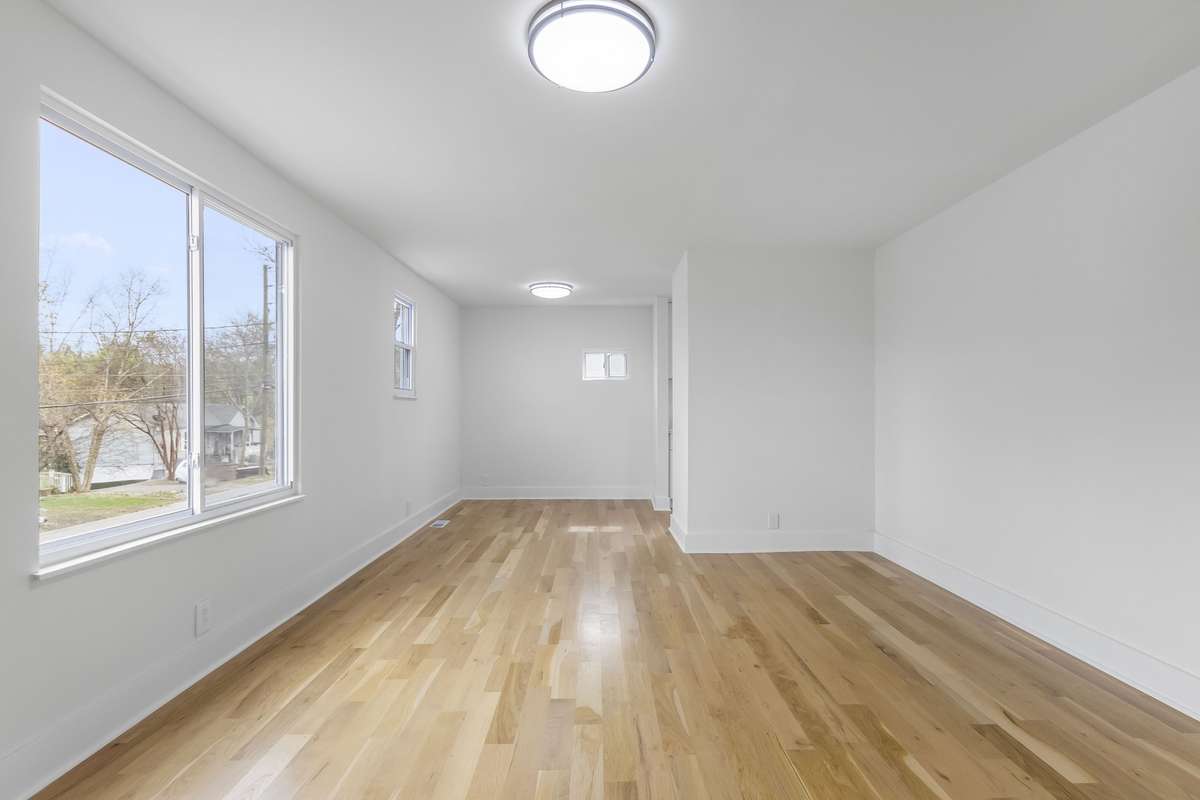 This fully renovated home offers bright, open living space with durable luxury vinyl plank flooring.