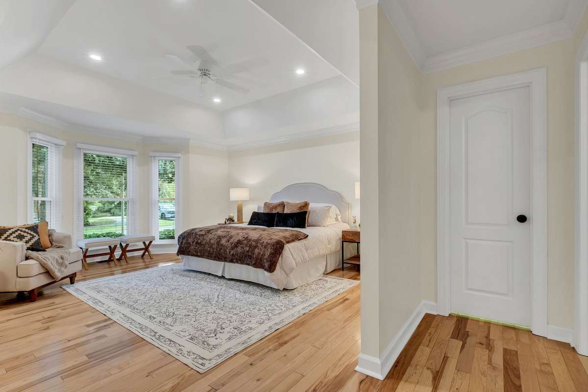 The primary bedroom is very large and has a nice walk-in closet.