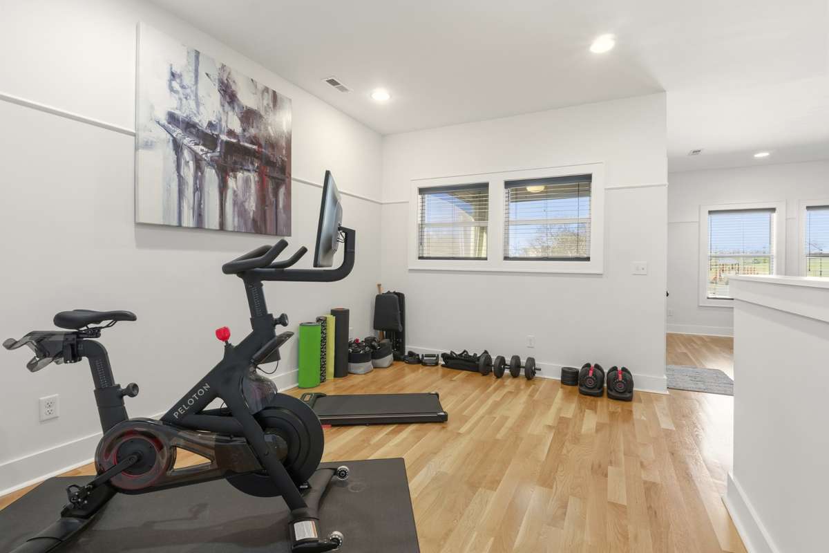 Flex space that is being used a workout space but could be used as an office as well!
