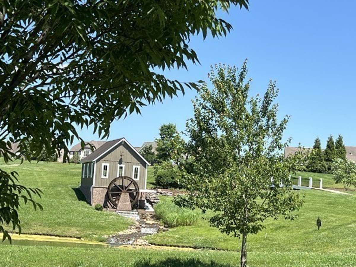 In addition to the amenities offered in Millstone, the community also features some beautiful design elements, such as The Mill House!