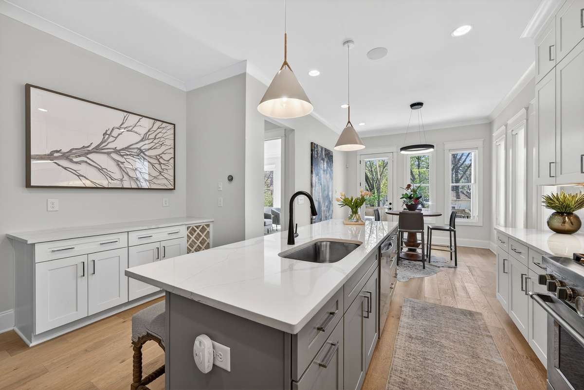 An open-concept kitchen seamlessly connected to the main living areas.
