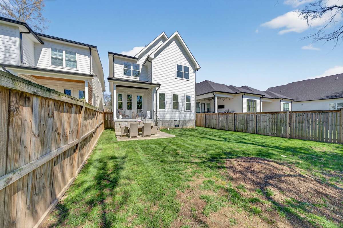A private backyard with space to relax, play, and entertain.