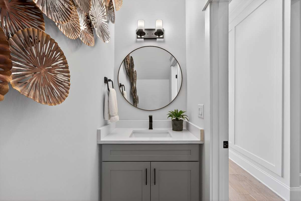 A stylish powder room with modern finishes.