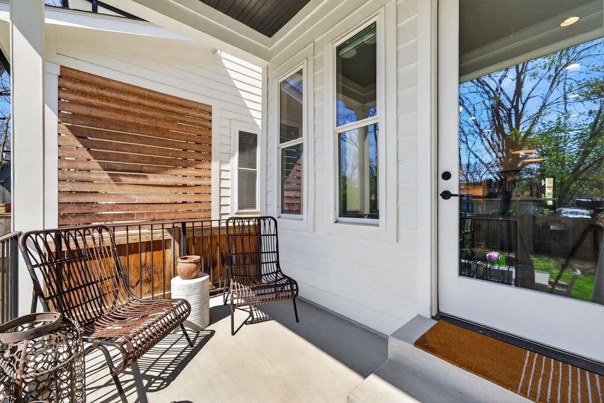 A private covered porch perfect for relaxing or entertaining.