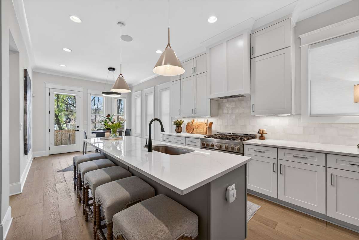 A beautifully appointed kitchen with a large island and premium finishes.