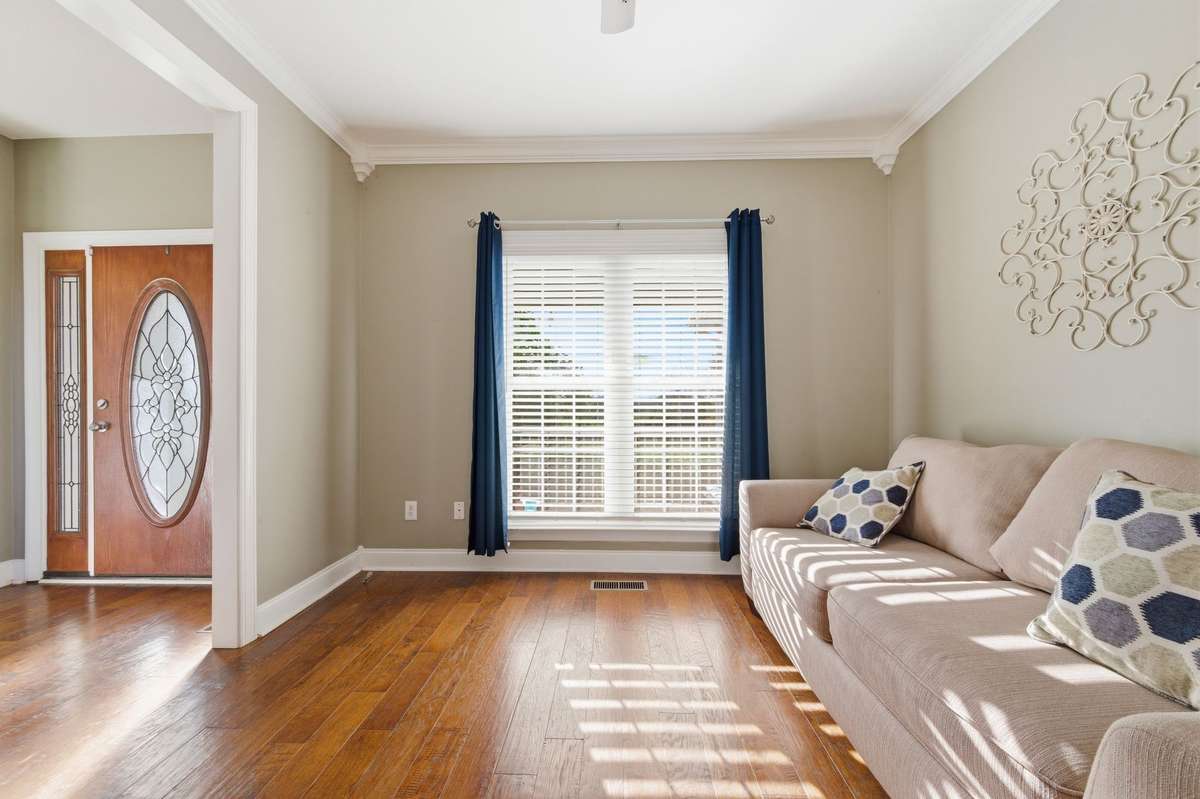 This versatile space can serve as a home office, separate den, or even a fourth bedroom, complete with a closet.