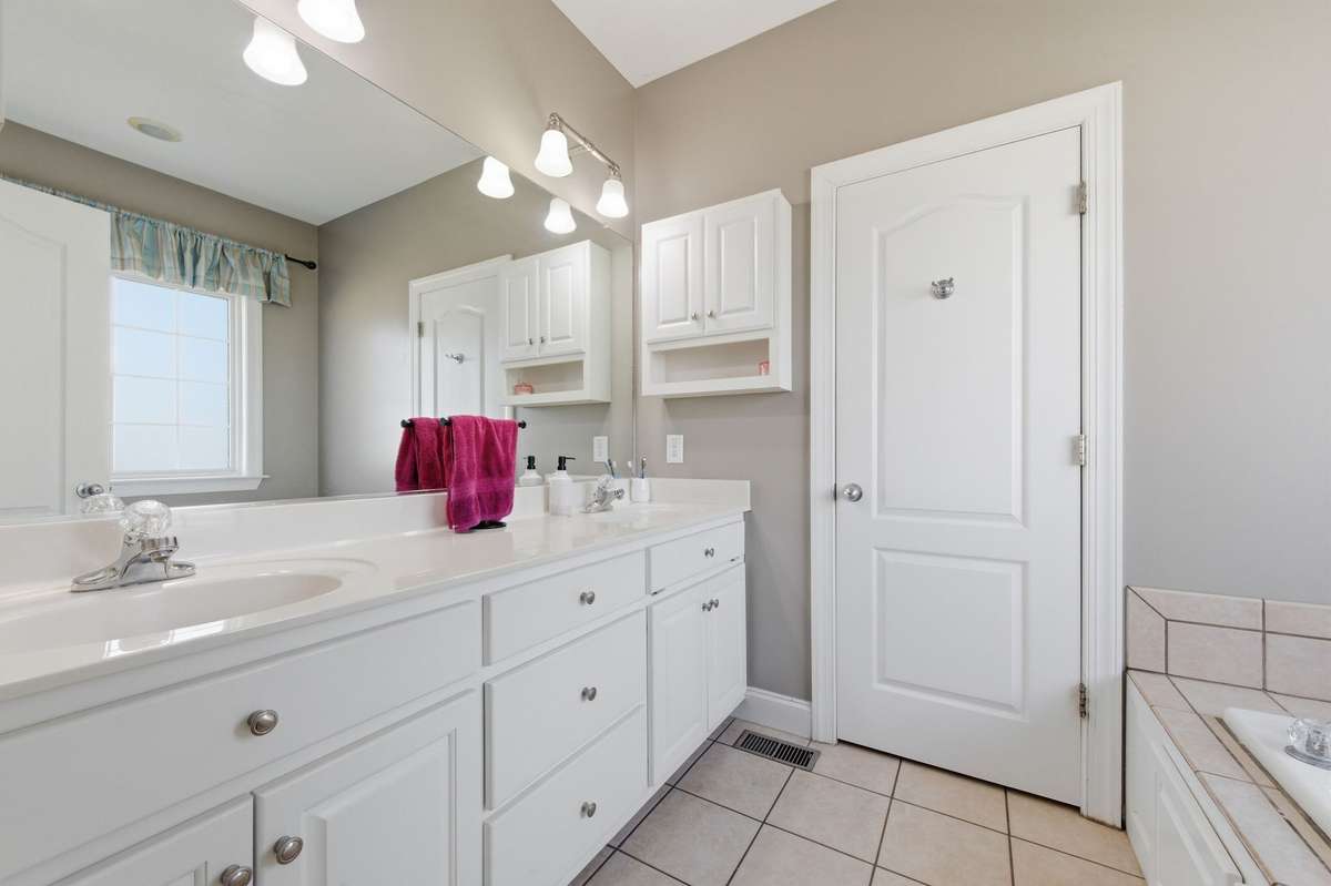 Enjoy ceramic tile finishes and your own jetted tub—perfect for unwinding after a long day.