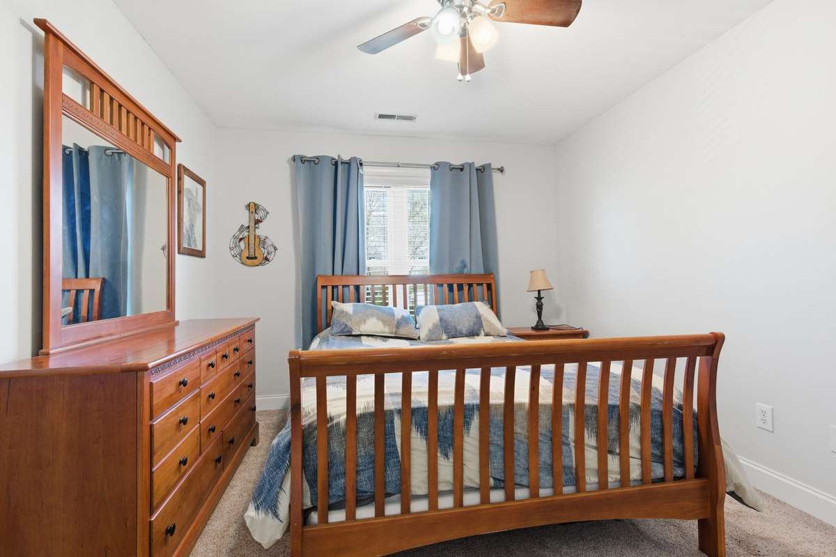 Bed 3 upstairs with comfortable carpet floors.