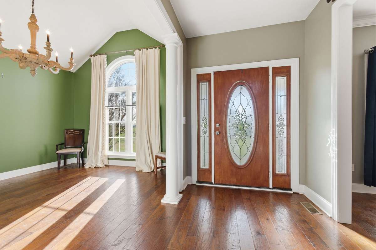 Multi-height ceilings throughout create a spacious, open feel and add architectural interest.