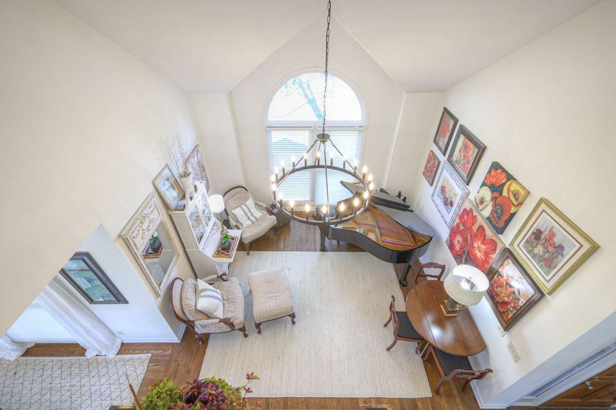 View into the front sitting room from upstairs.