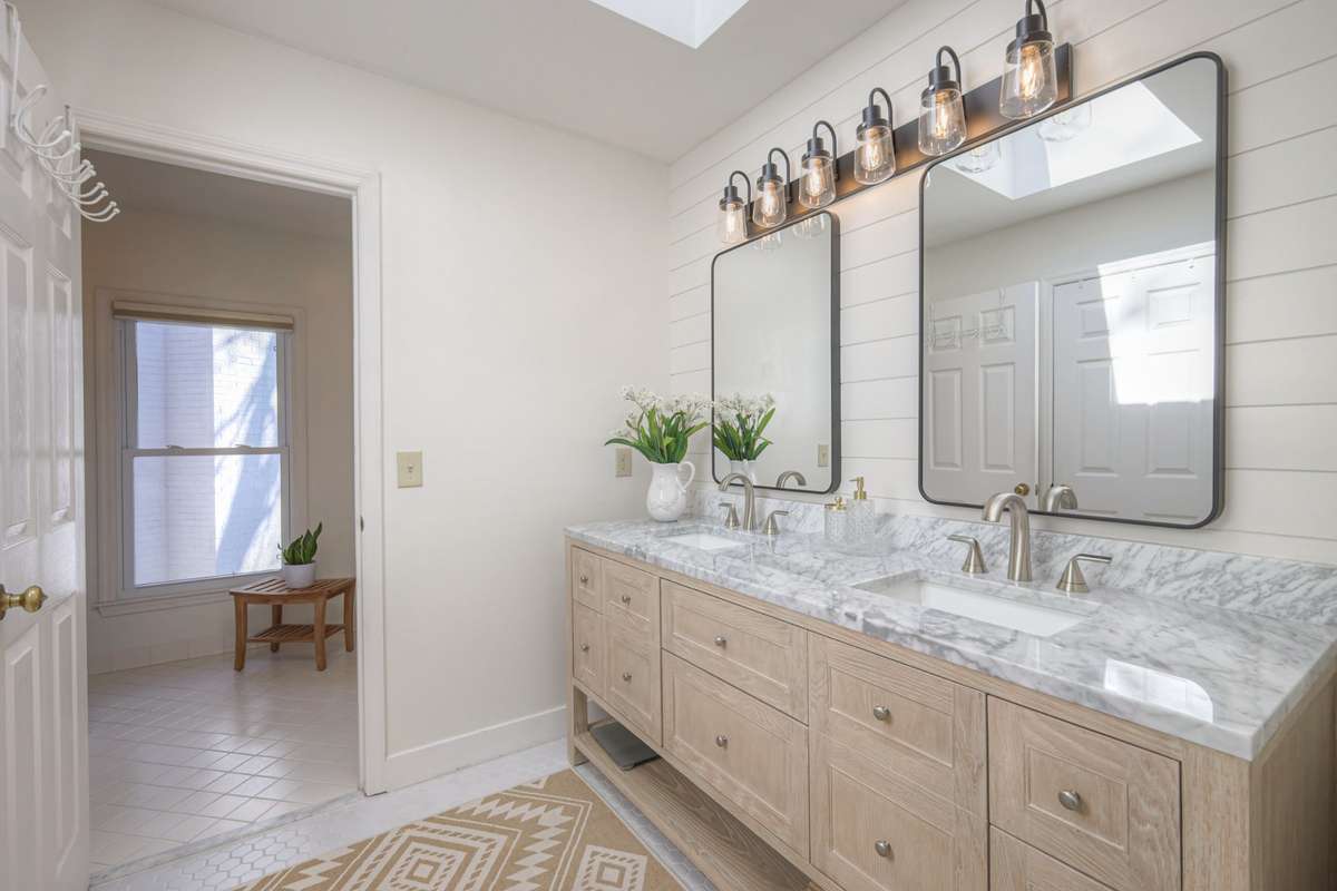 Primary bathroom with its double vanities