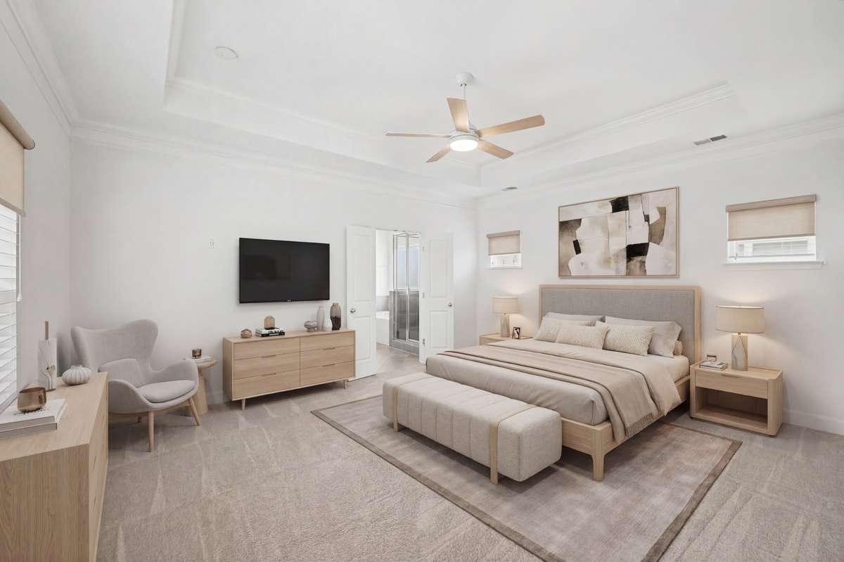 Virtually staging shows you how fabulous this primary suite will look with your things.