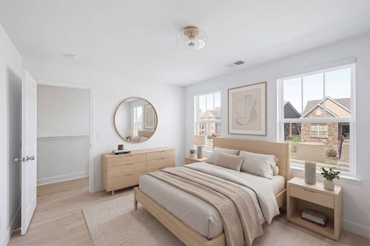 Flooded with light and a large walk in closet,  this bedroom is stunning.