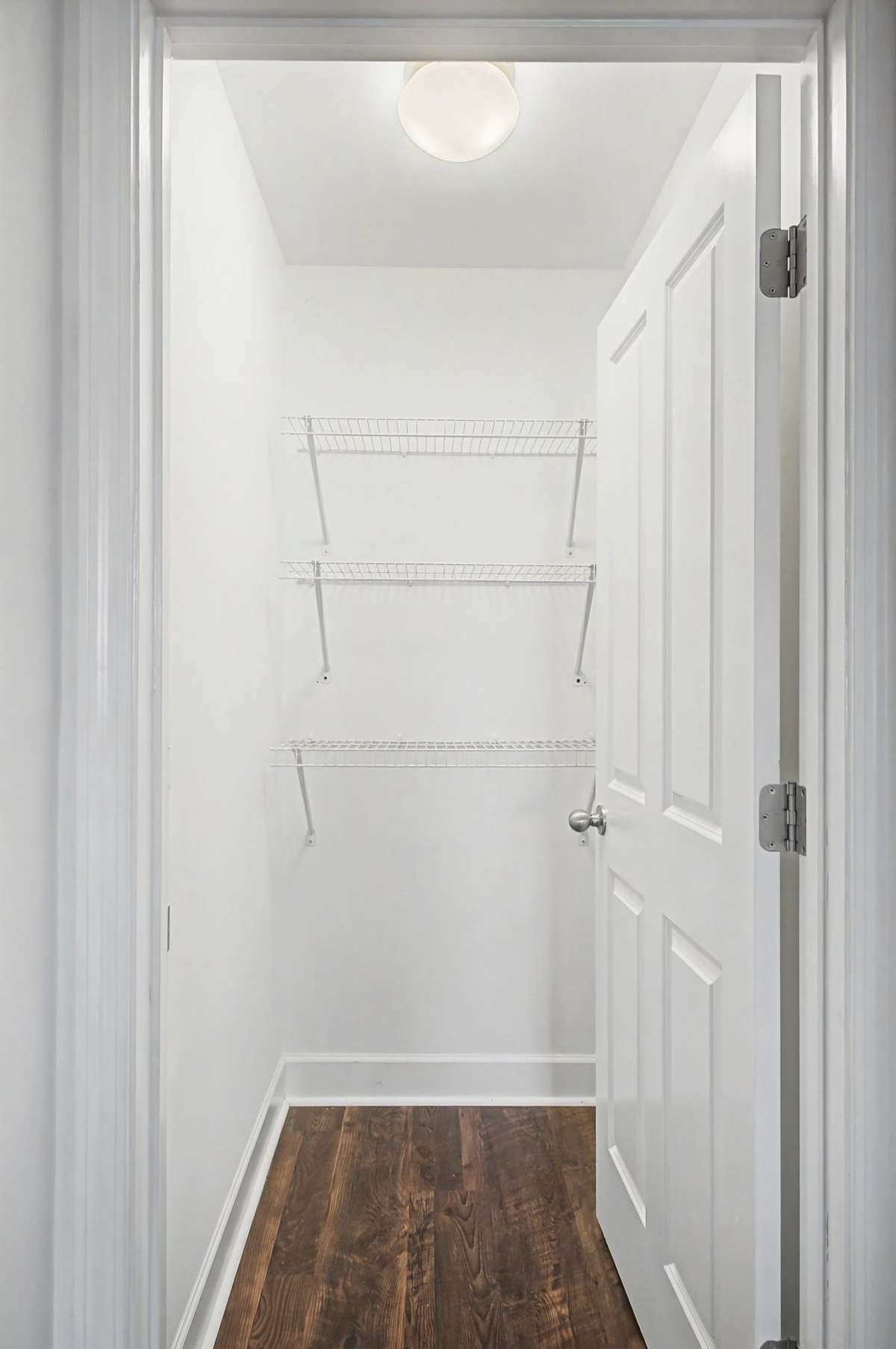 A large closet at the end of the hall gives plenty of extra space.