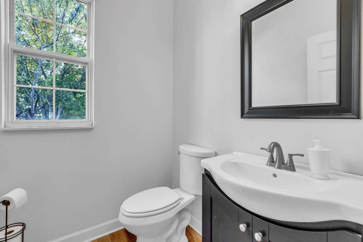 1/2 Bath between Living Room and Den