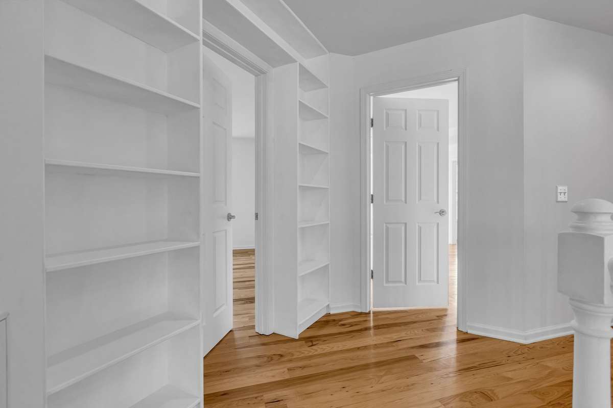 Landing has built-in bookshelves surround Bonus Room and next to Master Bedroom.