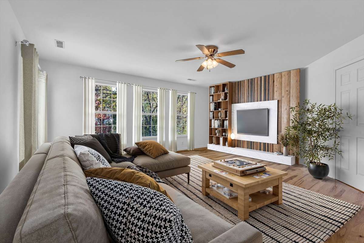 Comfortable space with lots of light in Bonus Room (virtually staged)