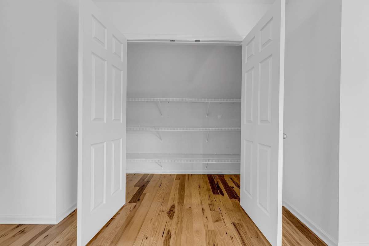 Extra Large Closet in Bedroom #2 has 20” deep shelves.