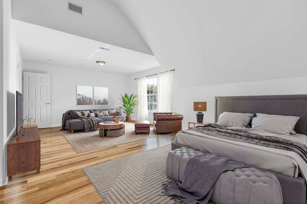 Expansive guest suite with sitting area possible in Bedroom #2 (virtually staged)