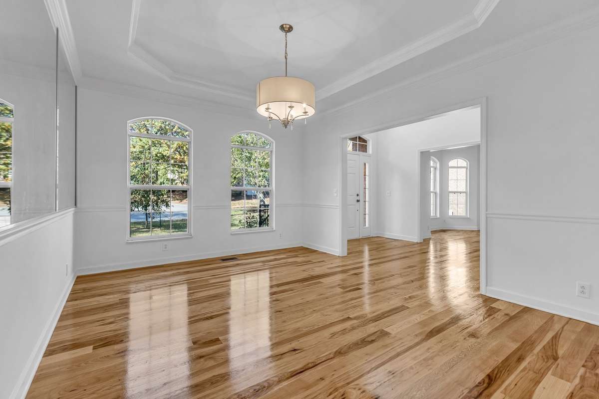 Lots of natural light in Dining Room from arched windows