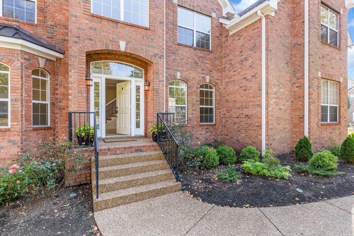 New landscaping leads up to the front door