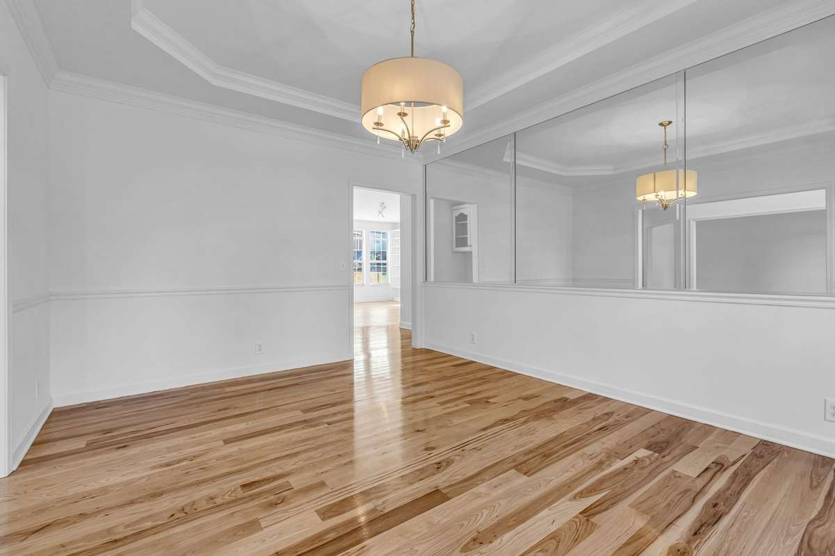 Dining Room leads into Kitchen and dry bar/desk in hall