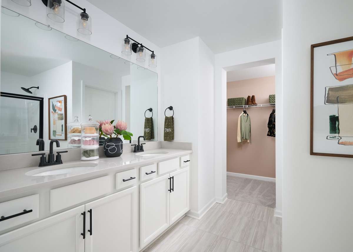 Tons of space in the Owner's bath. Photo is of the same floorplan but is the furnished model. Design options may change- see sales for specifics.