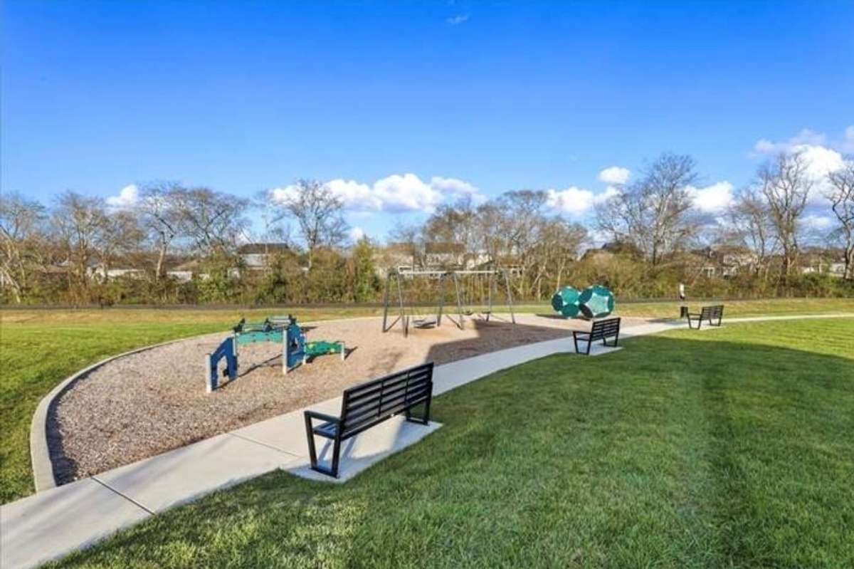 Playground, sidewalks, and a walking trail