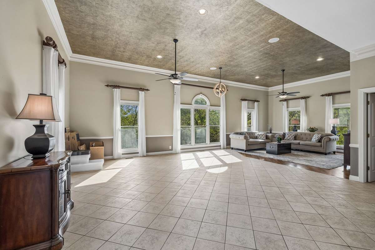 The decorative ceiling treatment enhances this space.