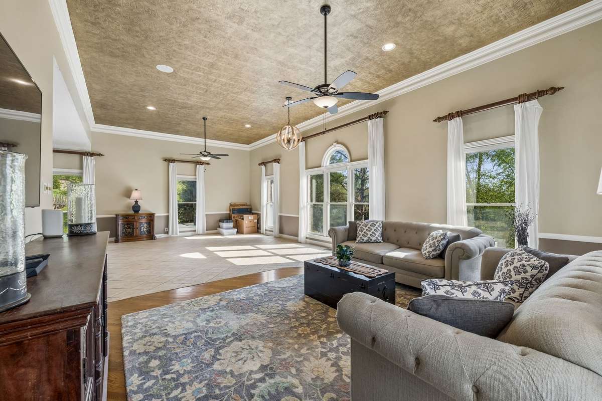 So many possibilities here!!  There is plenty of room for a pool table and extensive seating space for relaxing or entertaining.
