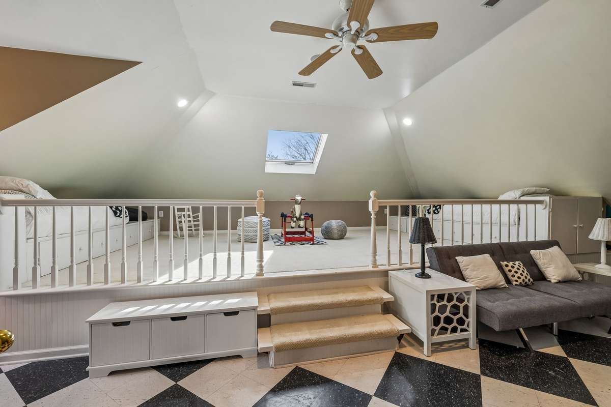 This sweet playroom has two levels and offers room on either side of this loft area for a single mattress ~ imagine the sleepover fun in this room!