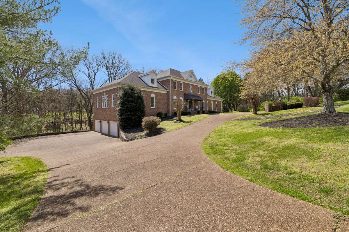 The circular drive, oversized three car garage and large extended driveway area offer plenty of space for parking for family and guests.  The new garage doors are insulated, a very ideal feature!