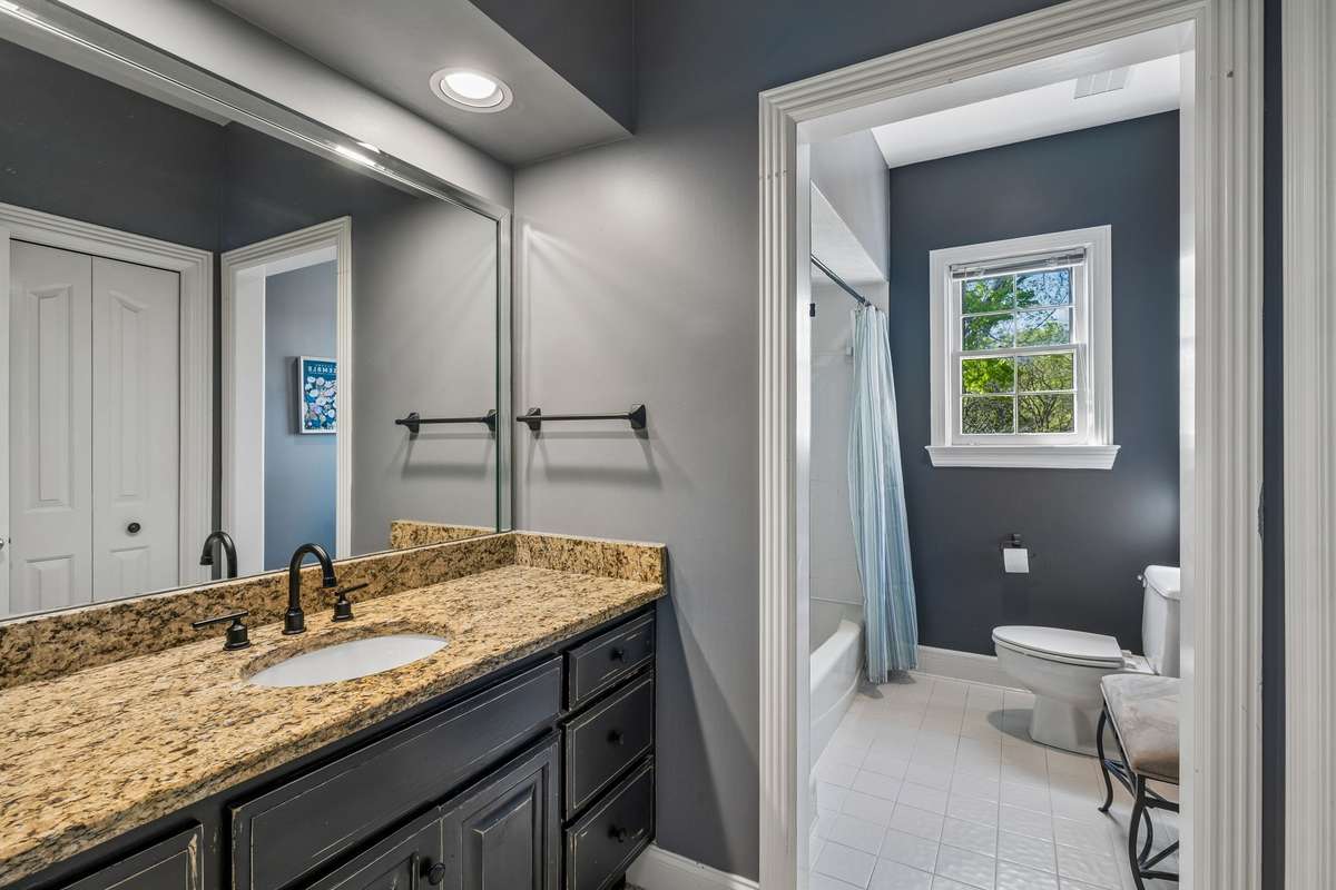 There is a large linen closet in this bathroom and just outside the entrance a desirable cedar closet for clothing or additional linens.