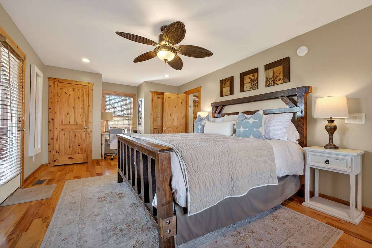 Master bedroom with lake view! Hot tub right off master bedroom suite!