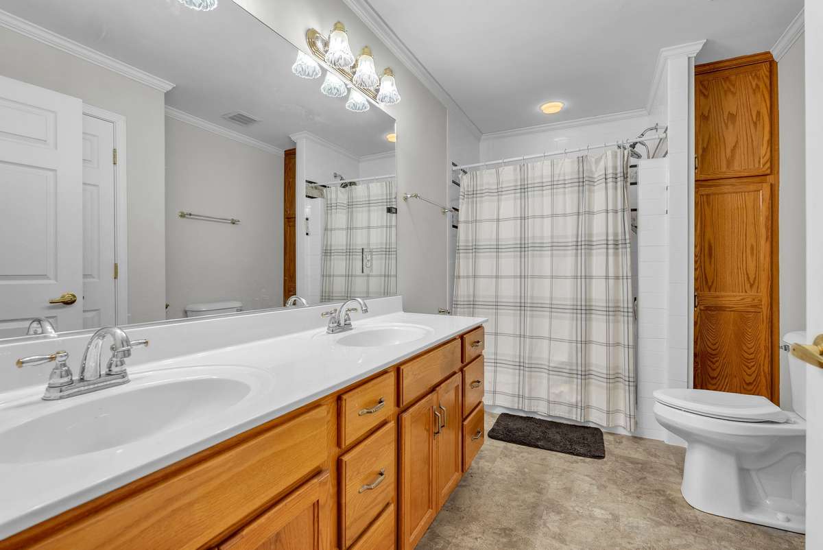 The primary bath has an oversized, double vanity providing ample storage in addition to a dedicated linen cabinet! 646 Forest Glen Circle, Murfreesboro, TN 37128