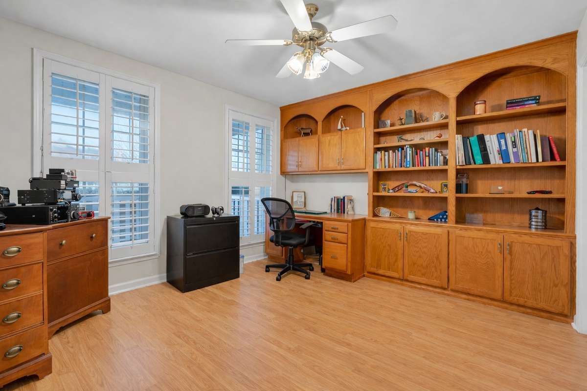 Home office features built in cabinetry, plantation shutters, and gorgeous hardwood flooring! 646 Forest Glen Circle, Murfreesboro, TN 37128