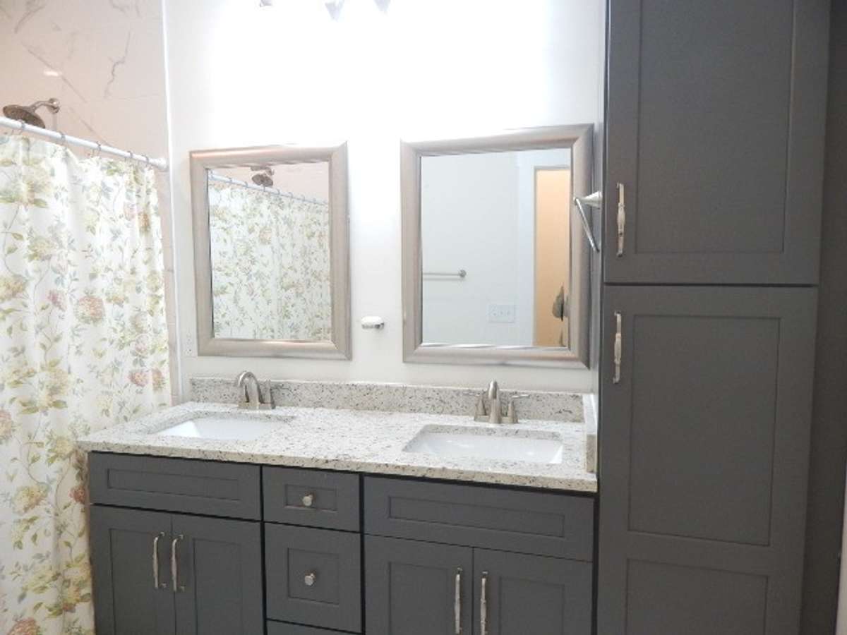 This bathroom has tiled flooring.